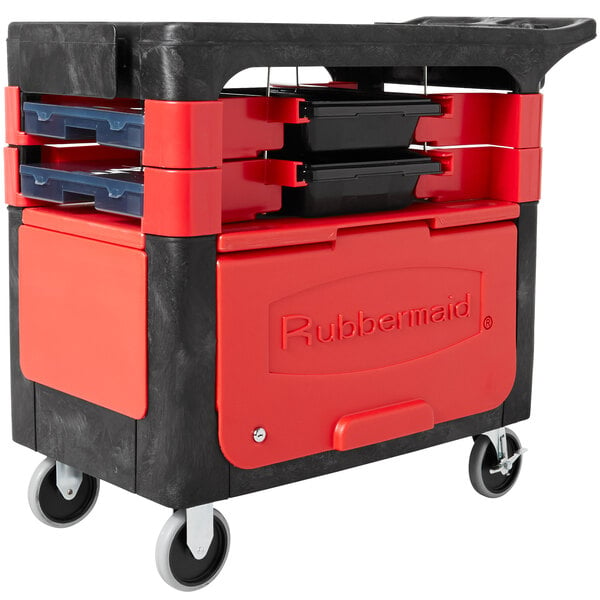 A black Rubbermaid TradeMaster cart with a red handle and locking cabinet.