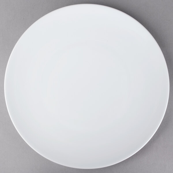 A Schonwald white porcelain coupe plate on a gray surface.