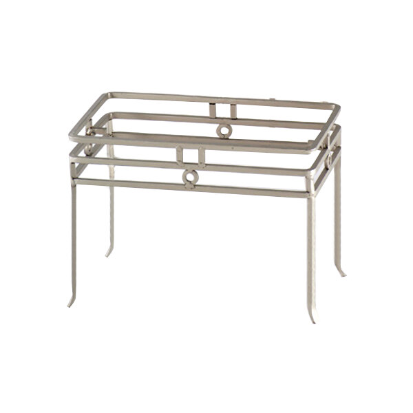 A Clipper Mill chrome powder coated iron rectangular riser with satin finish and three metal legs.