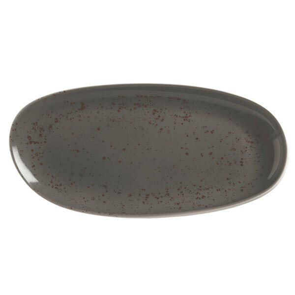 A grey oval Schonwald porcelain platter with red specks.