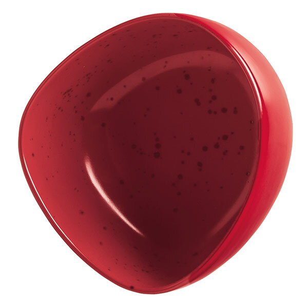 A Schonwald red porcelain bowl with black specks.