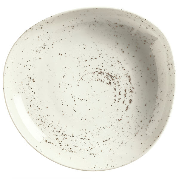 A white Schonwald porcelain bowl with speckled spots.