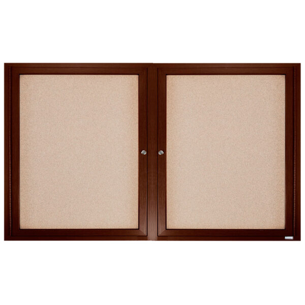 A brown framed enclosed bulletin board with wood panels.