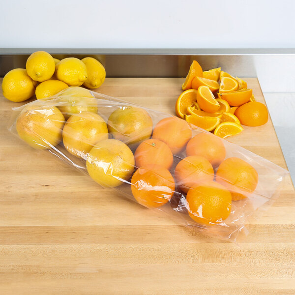 An orange in a LK Packaging plastic bag.