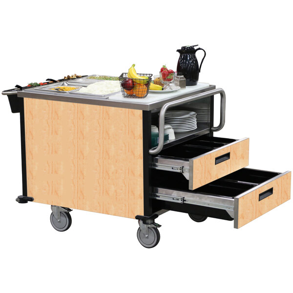 A Lakeside SuzyQ meal serving system with two heated wells on a wooden cart.