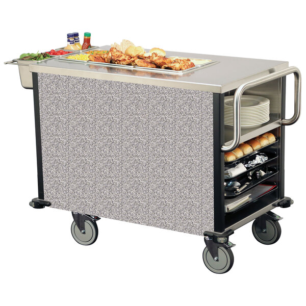 A Lakeside dining room meal serving system on a food cart with food on it.