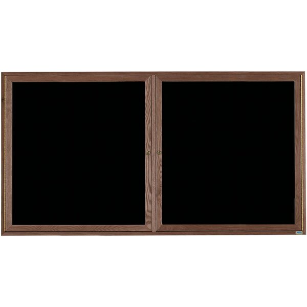 Two Aarco black wooden framed bulletin boards.