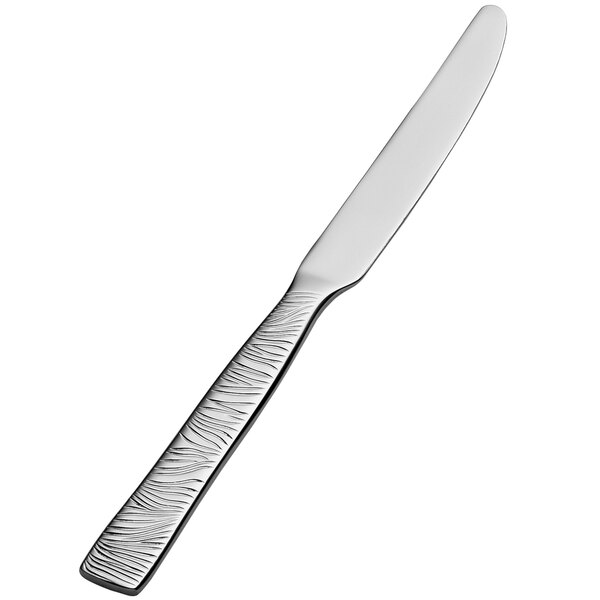 A Bon Chef stainless steel butter knife with a patterned handle.