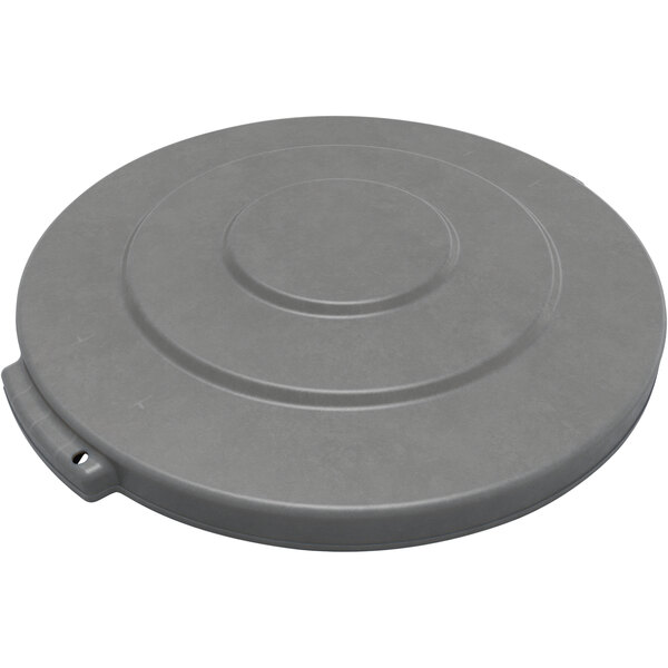 A Carlisle grey plastic lid for a round trash can with a circular hole.