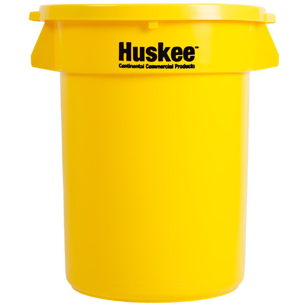 A yellow Continental Huskee round trash container with a yellow lid and black text.