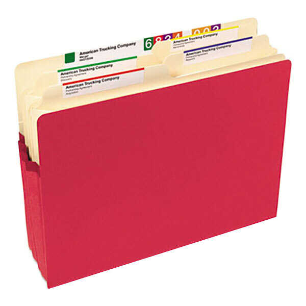 A red Smead file pocket with a label inside.