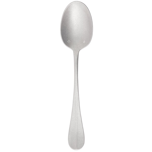 A silver Chef & Sommelier dessert spoon with a white handle.