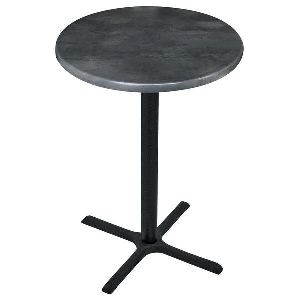 A Holland Bar Stool black steel laminate round table top with a black cross base.