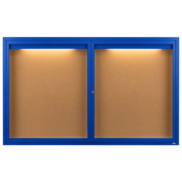 A blue Aarco bulletin board cabinet with two doors open to reveal two blue enclosed bulletin boards with lights.