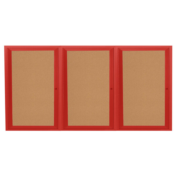 A red powder coated Aarco bulletin board cabinet with three doors.