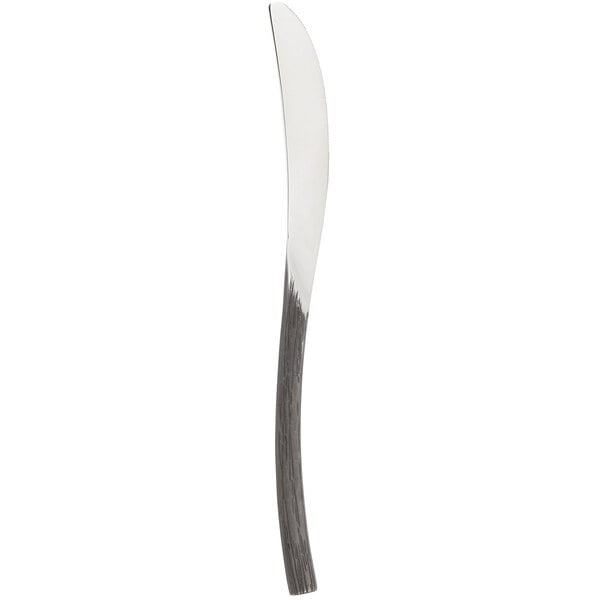 A Chef & Sommelier stainless steel dinner knife with a black and white oak handle.