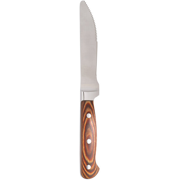 A Chef & Sommelier steak knife with a brown wooden handle.