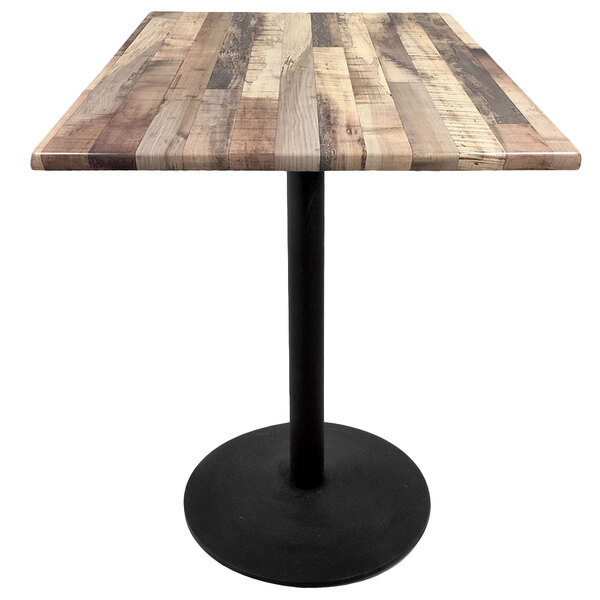 A Holland Bar Stool rustic wood laminate table top on a black round base.