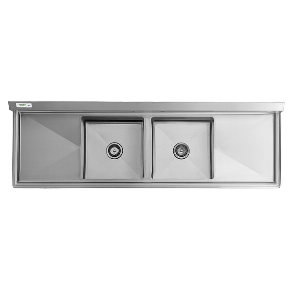 A Regency stainless steel two compartment sink with drainboards.