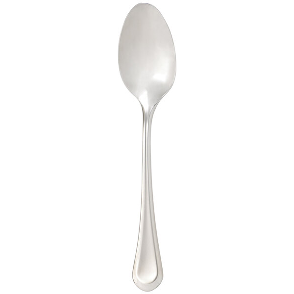 An Arcoroc stainless steel teaspoon with a white handle.