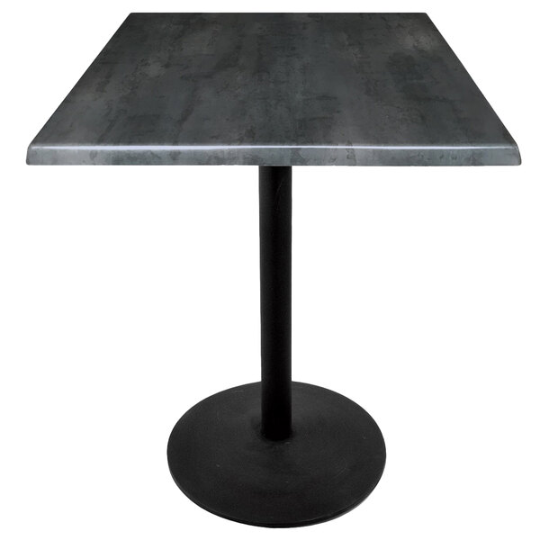 A Holland Bar Stool black steel laminate table with a black steel round base and square top.