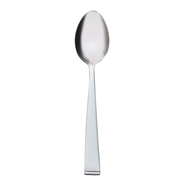A stainless steel dessert spoon with a silver handle.