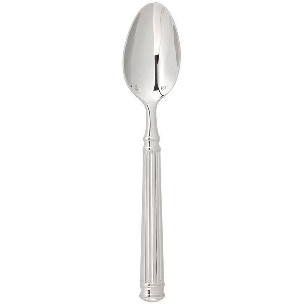 A close-up of a Chef & Sommelier stainless steel dessert spoon with a fluted handle.