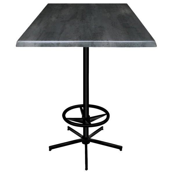 A Holland Bar Stool black steel laminate bar table with a metal base.