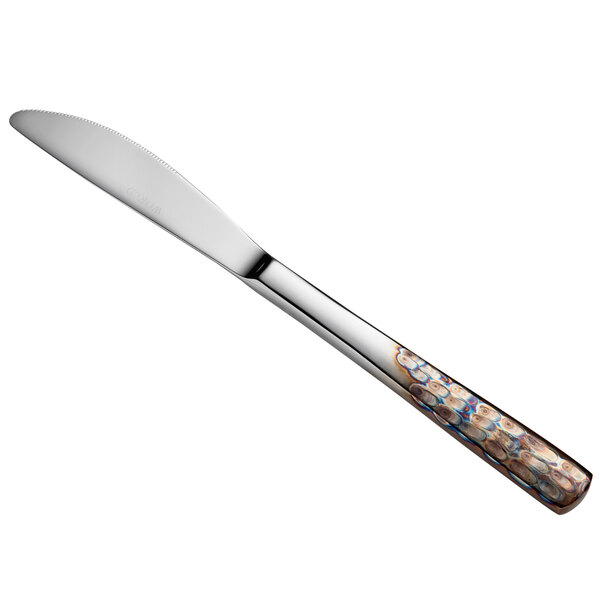 A Master's Gauge by World Tableware stainless steel dinner knife with a solid handle.