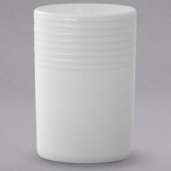 A white cylindrical container with a white lid.