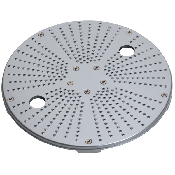 A circular metal plate with holes.