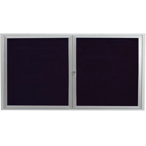 Two black glass doors with black frames enclosing a black letter board.