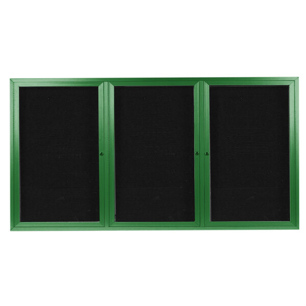 A green rectangular message center with black trim and three doors.