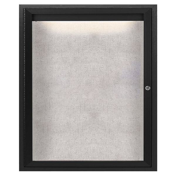 A black framed cabinet with a lighted white screen.