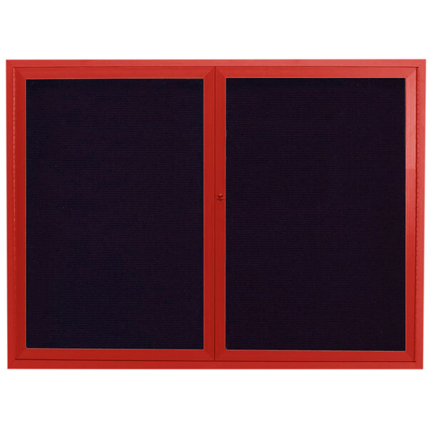 A red rectangular Aarco message center with black letter boards.