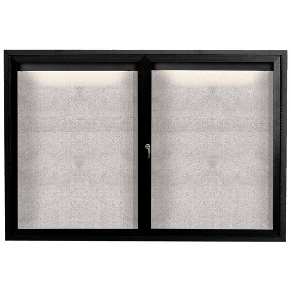 A black framed window with glass and a key on a white background.