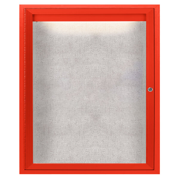 A red frame with a white glass door enclosing a bulletin board.