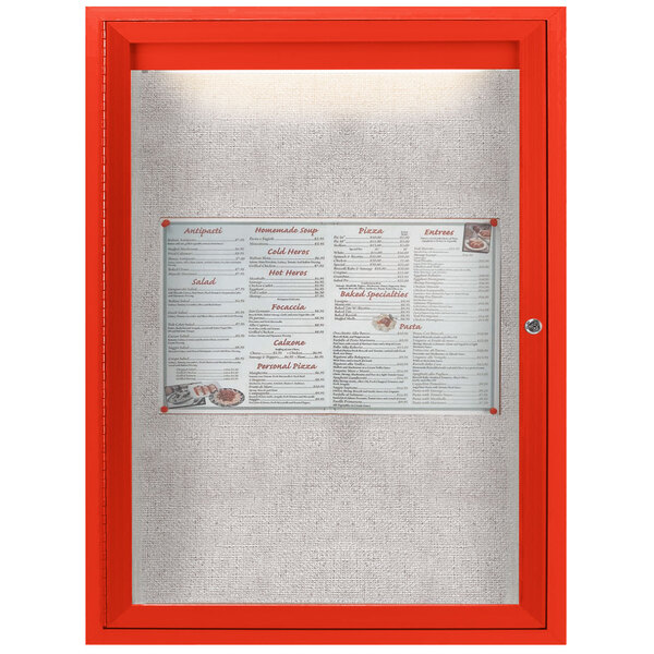 A red outdoor lighted bulletin board cabinet with a menu in a glass case.
