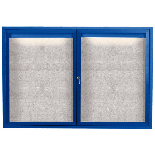 A blue powder coated cabinet with two hinged doors with windows.