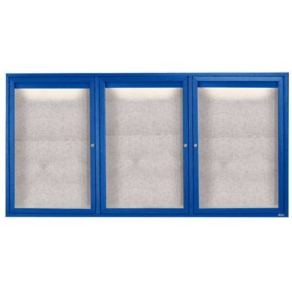 A blue cabinet with three white glass doors.