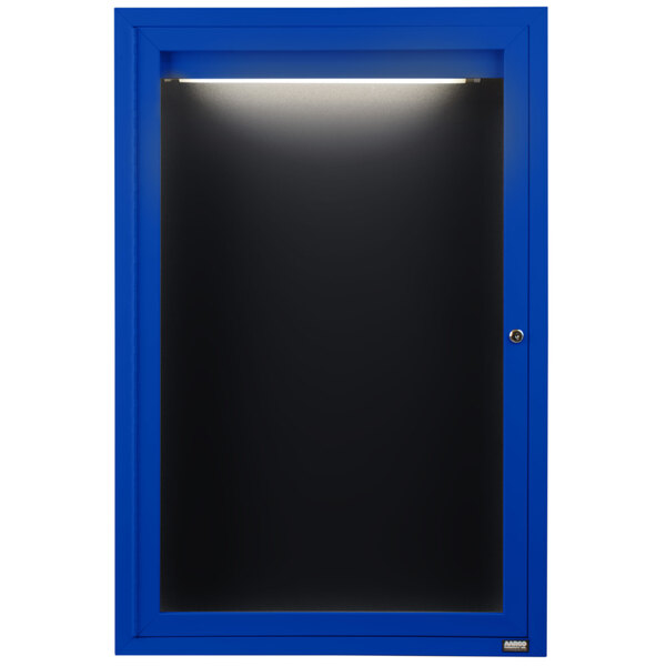 A blue metal cabinet with a light on a black door.