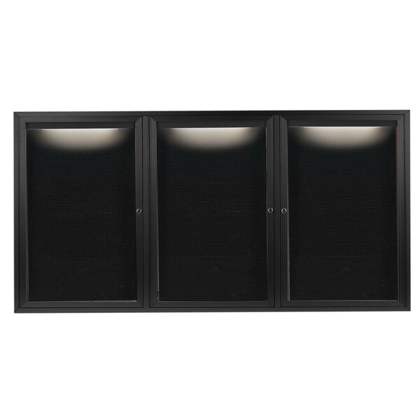 A black rectangular Aarco message center with 3 black glass doors and a black letter board inside.