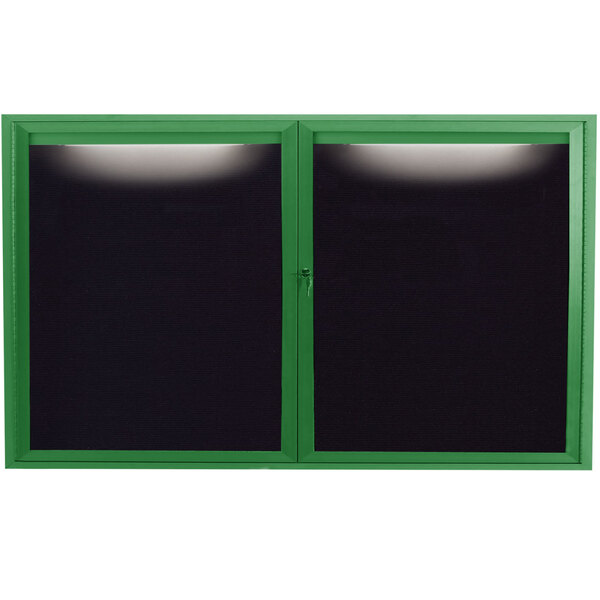 An Aarco green aluminum enclosed bulletin board with black letter board and two doors.