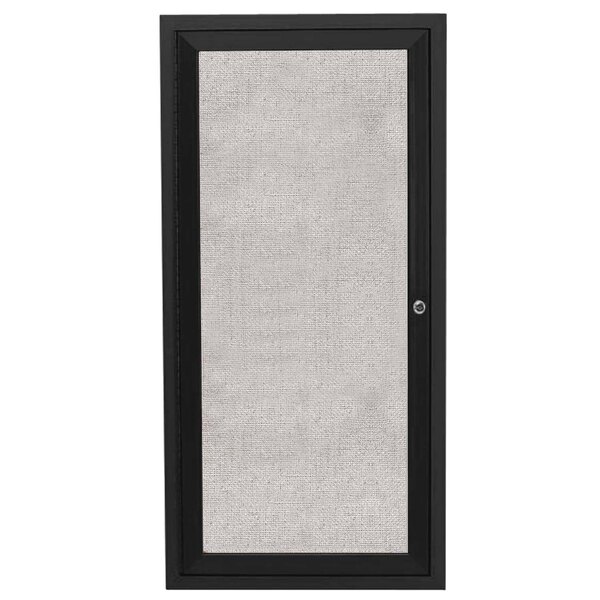 A black door with a white mesh screen on an Aarco Outdoor Bulletin Board Cabinet.