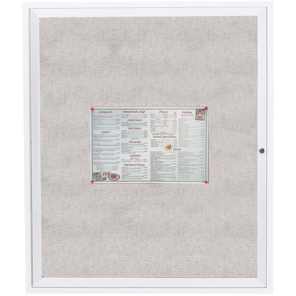 A white Aarco outdoor bulletin board with a menu and price list inside.