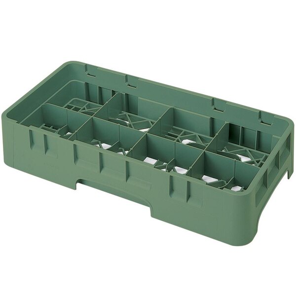 A green plastic container with compartments and holes.