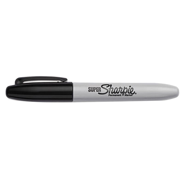A close-up of a Sharpie fine point permanent marker with a black cap and black ink.