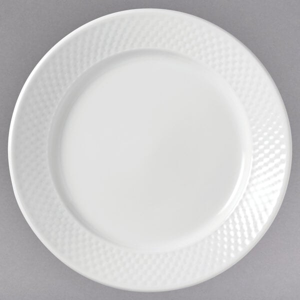 A white Libbey porcelain plate with a textured pattern.