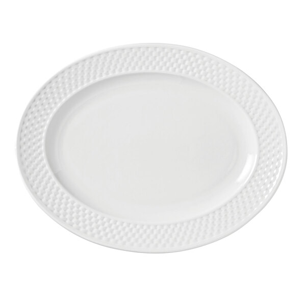 A white Libbey porcelain platter with a textured border.