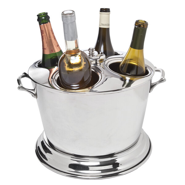 A silver Franmara wine cooler bucket with bottles of wine in it.